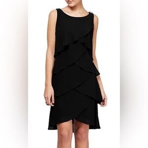 Ignite Evenings
Chiffon Tulip Tiered Hem Sleeveless Round Neck Sheath Dress